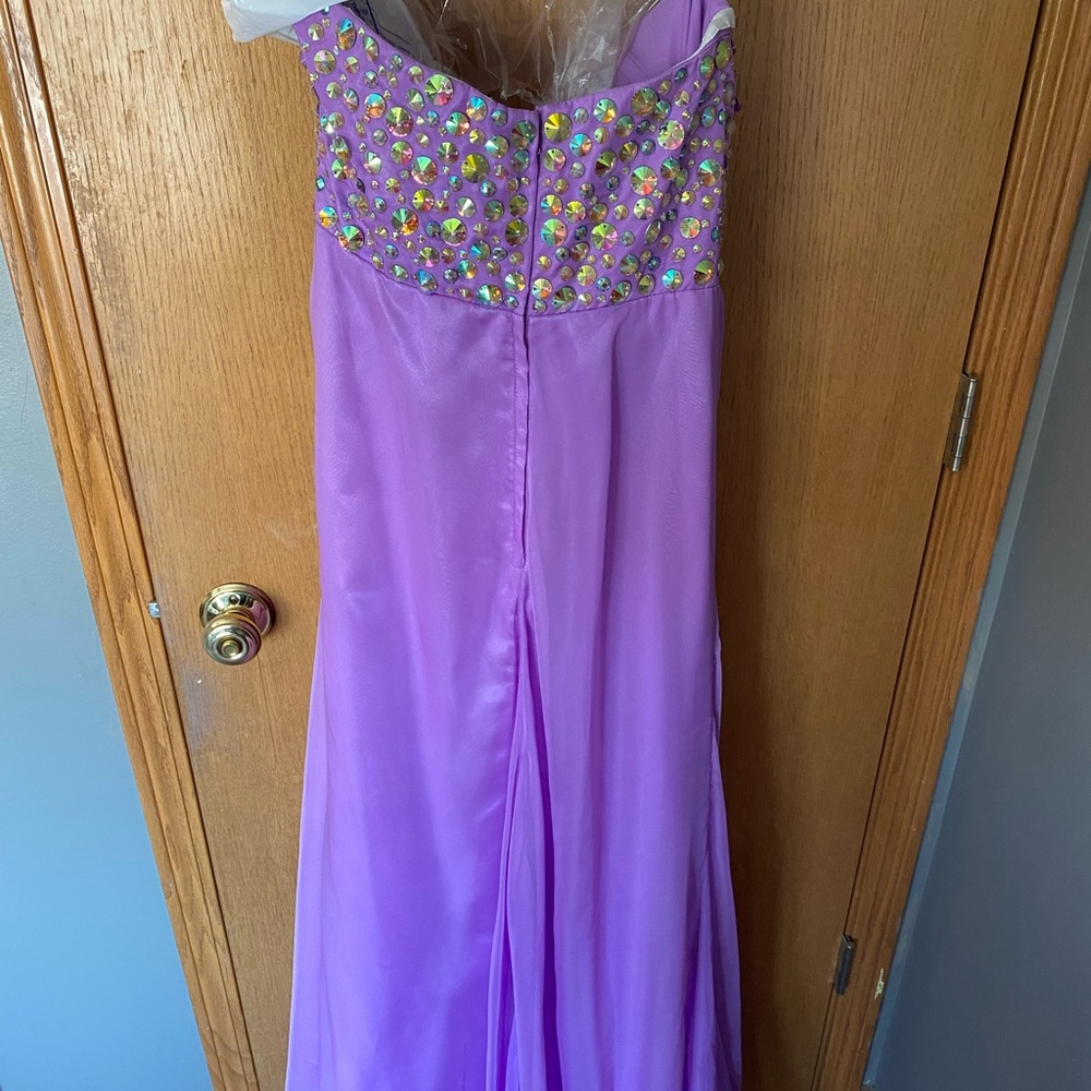 Size 14 prom/homecoming dress. Never worn.